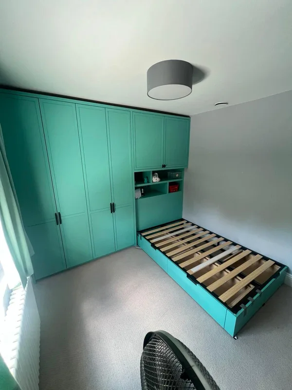 Bespoke teal wardrobe with bed frame