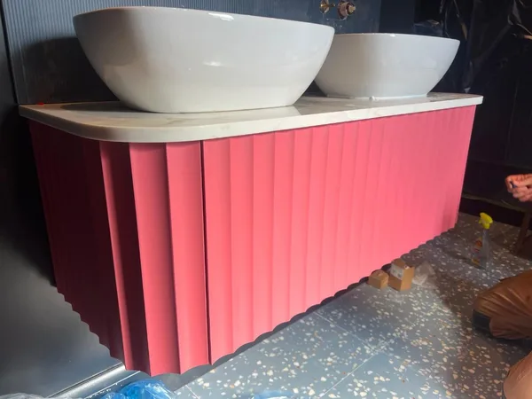 Bespoke pink fluted bathroom vanity double basin